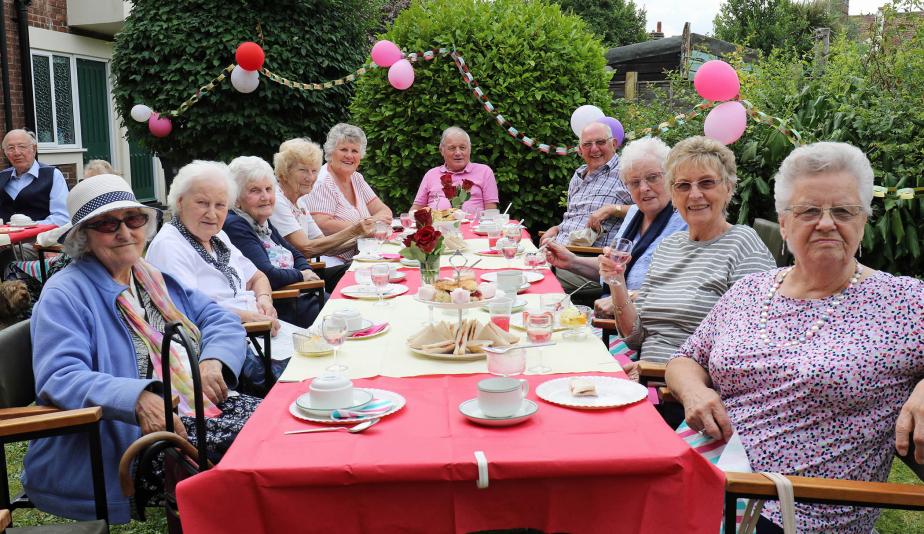 Residents of Norwich Housing Societys Eleanor Road complex enjoying their Strawberry Tea