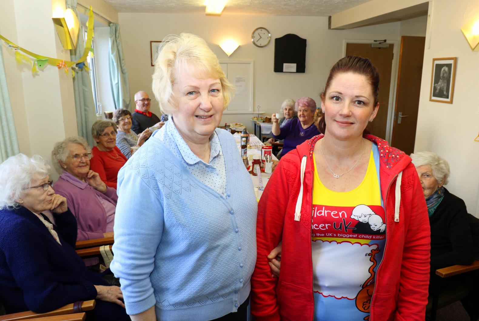 Marathon runner Marie Charles right with her mum Kathy Glanville at the fundraising coffee morning at Eleanor Road vsm2